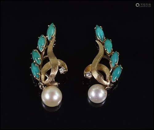 A Pair of Turquoise and Diamond Earclips.