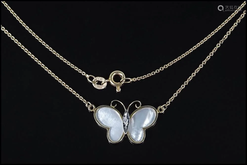 A Mother-of-Pearl Butterfly Necklace.