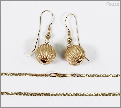 A Pair of 14 Karat Yellow Gold Earrings.