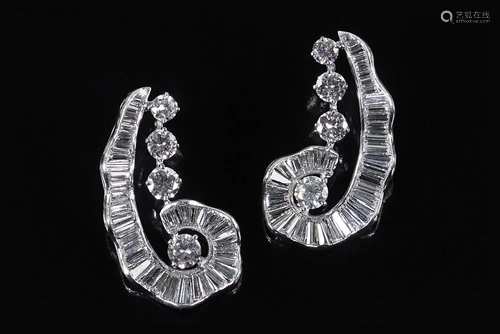 A Pair of Diamond Earrings.