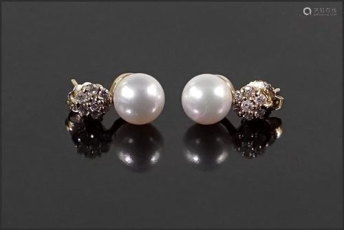 A Pair of Pearl and Diamond Earrings.