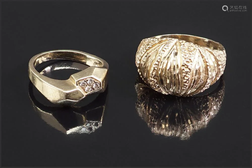 Two 14 Karat Yellow Gold Rings.