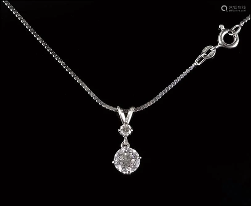 A Diamond Pendant Necklace.