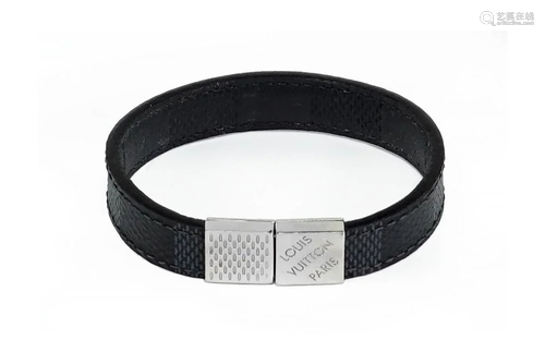 A Louis Vuitton Pullit Reversible Bracelet.