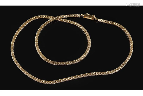 A 14 Karat Yellow Gold Necklace.