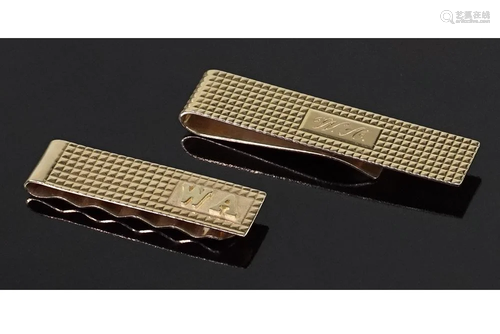 Two 14 Karat Yellow Gold Money Clips.