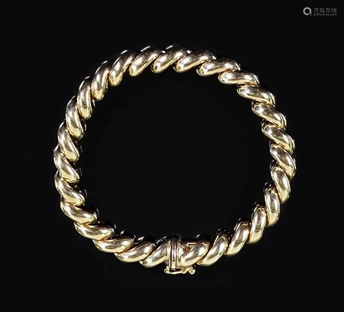 A 14 Karat Yellow Gold Bracelet.