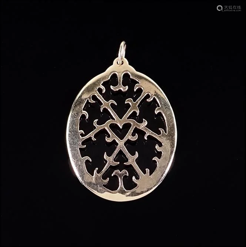 A 14 Karat Yellow Gold Pendant.