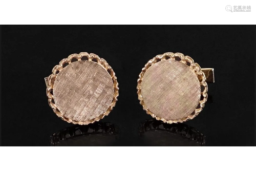 A Pair of 14 Karat Yellow Gold Cufflinks.