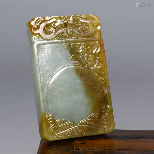 A Chi-dragon Carved Jadeite Inscribed Pendant