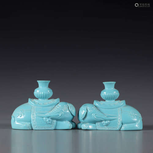 A Pair of Pea-Green Glazed Porcelain Elephant Ornaments