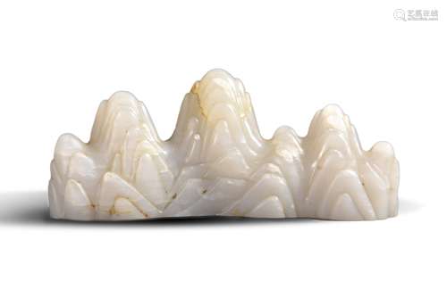 A white jade mountain-shaped brush stand