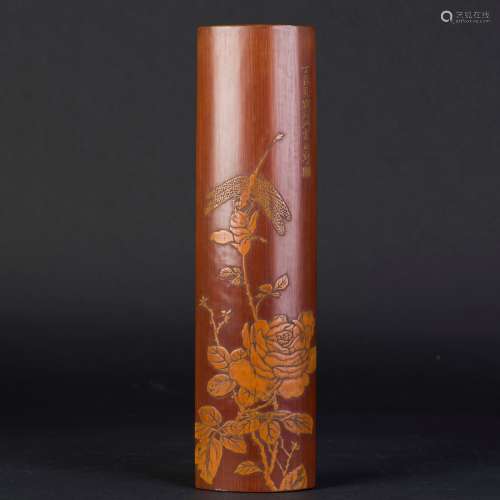 A BAMBOO-CARVED ARM REST WITH FLORAL MOTIF CARVING