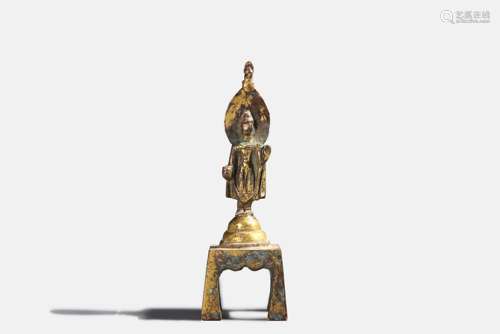 A gilding copper buddha statue