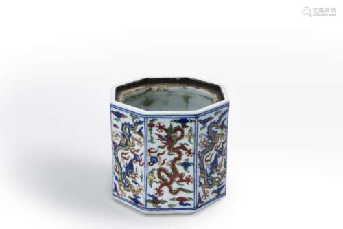 A blue and white multicolored dragon porcelain octagonal bru...