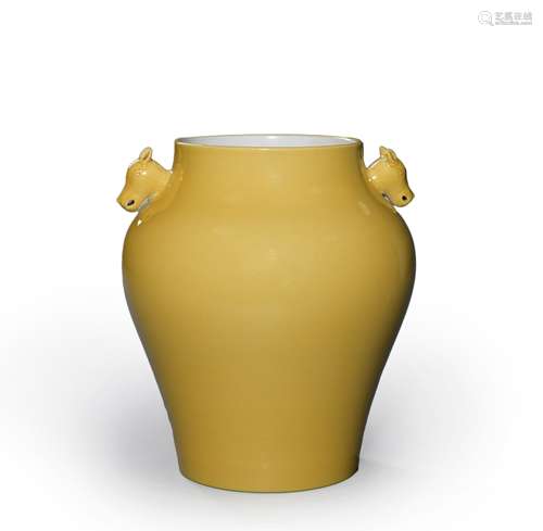 A yellow glazed porcelain double-eared jar