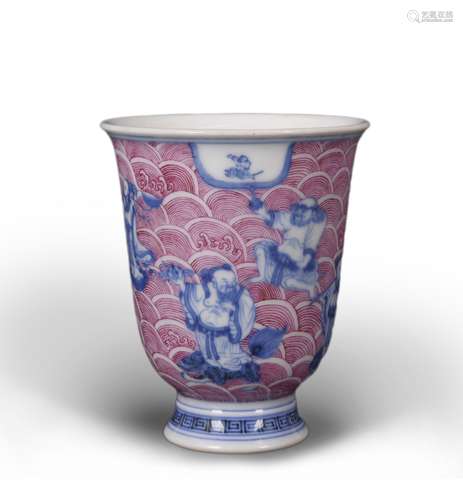 A pink ground blue and white figure porcelain cup