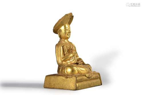 A gilding copper sitting Panchen Lama statue