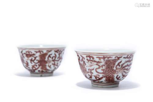 A pair of iron red phoenix porcelain cups