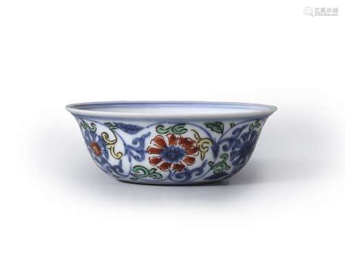 A blue and white multicolored flower porcelain cup