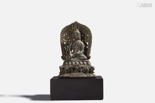 An alloy copper sitting Sakyamuni statue