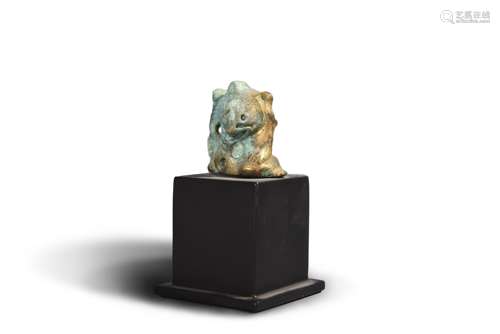 A bronze carved bear