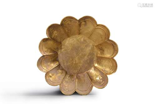 An interlocking flower carved gold cup