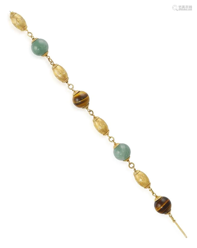 A TIGER'S EYE, AVENTURINE AND GOLD BRACELET, CIRCA 1965