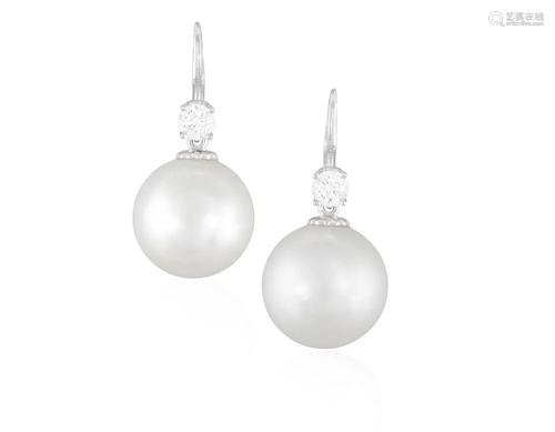 A PAIR OF CULTURED PEARL AND DIAMOND EARRINGS Each