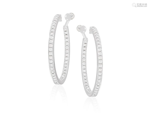 A PAIR OF DIAMOND HOOP EARRINGS, BY CARTIER Each hoop