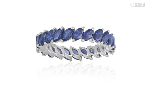 A SAPPHIRE ETERNITY RING Composed of a continuous row