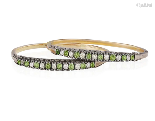 A PAIR OF LATE 19TH CENTURY DIAMOND AND PERIDOT BANGLES