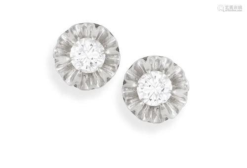 A PAIR OF DIAMOND EARSTUDS Each brilliant-cut diamond