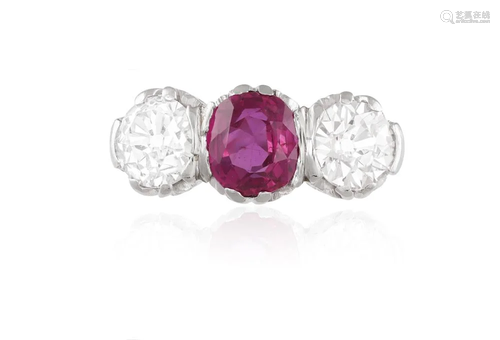 A FINE RUBY AND DIAMOND THREE-STONE RING Composed of a