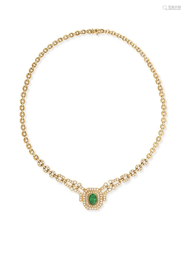 AN EMERALD AND DIAMOND NECKLACE The oval-shaped emerald