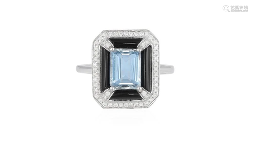 AN AQUAMARINE, DIAMOND AND ONYX DRESS RING The central