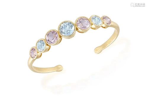 A KUNZITE AND BLUE TOPAZ BANGLE, BY MICHELE DELLA VALLE