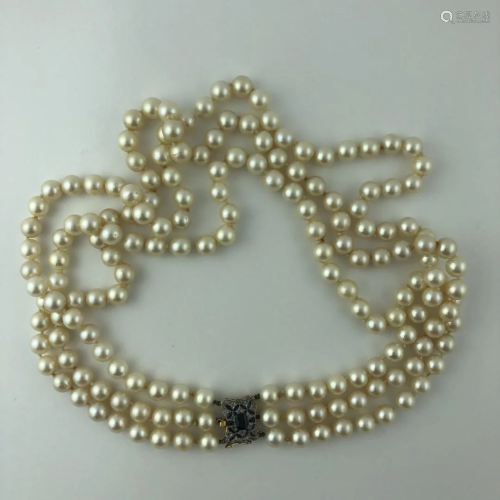Three strands pearls necklace