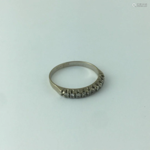 18 K gold half eternity ring