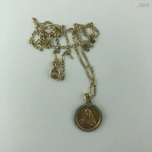 Set of 18 K gold medal and chain