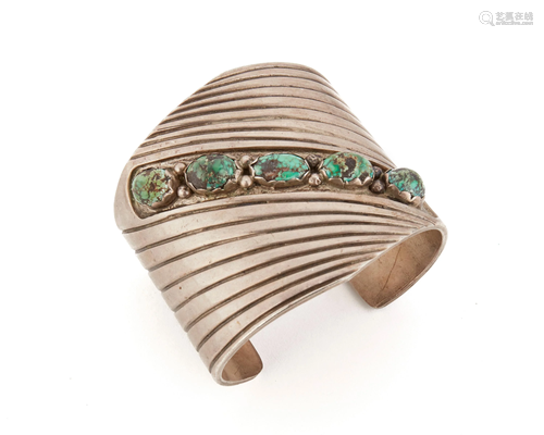 A Southwest turquoise wide cuff bracelet