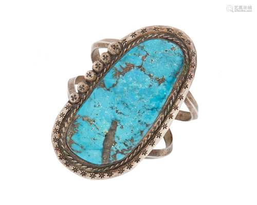 A large Southwest turquoise cuff bracelet