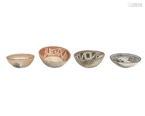 Four Mimbres-style bowls