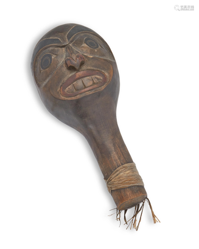 A carved polychrome Haida rattle