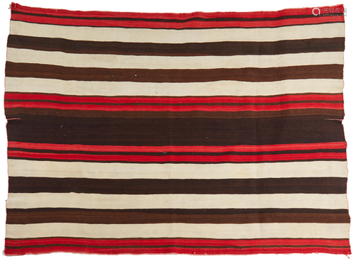 A Late-Classic First Phase Navajo wearing blanket