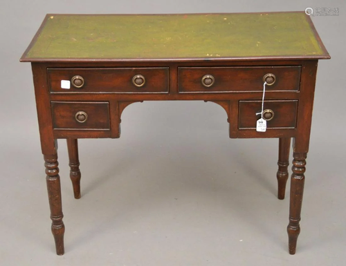 English Mahogany writing desk with worn eather surface,