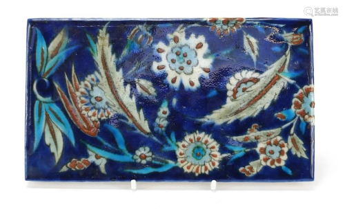 Turkish Iznik tile fragment hand painted with flowers