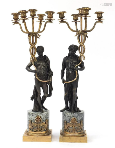 Large pair of classical partially gilt and patinated