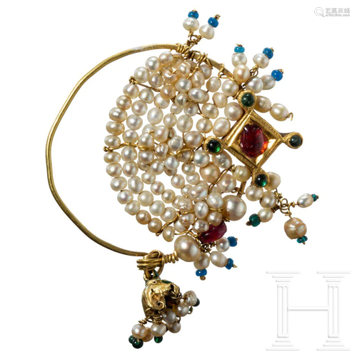 An Indian gold earring set with pearls and rubies,