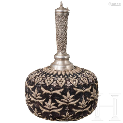 A velvet-covered, embroidered silver water flask,